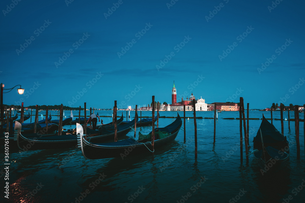 gondolal at night and San Giorgio Maggiore church, Venice, Italy