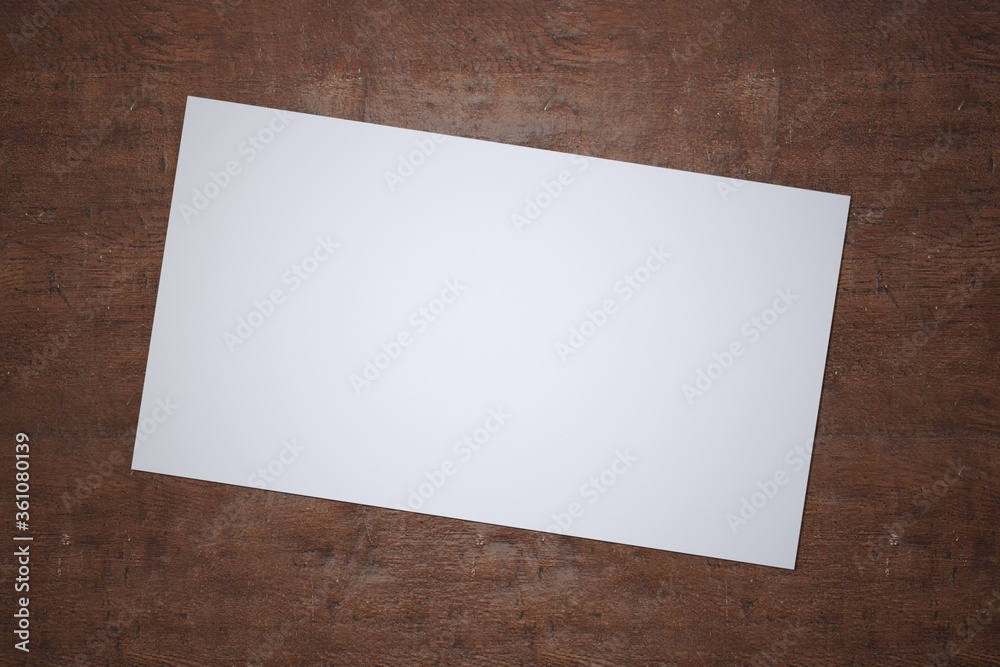 White paper sheet on wooden background. Template of A4 document and blank space for text. White paper sheet on wooden background. Template of A4 document and blank space for text.