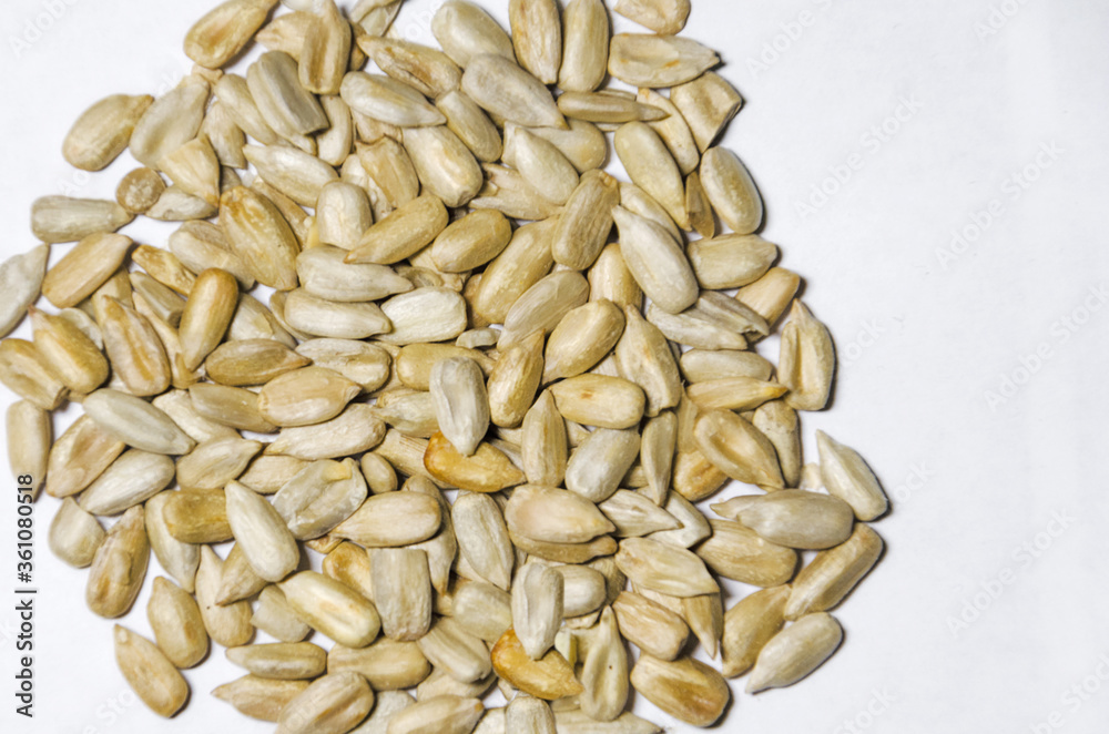 Pile of sunflower seeds without shell isolated on white background. Pile of sunflower seeds without shell isolated on white background.