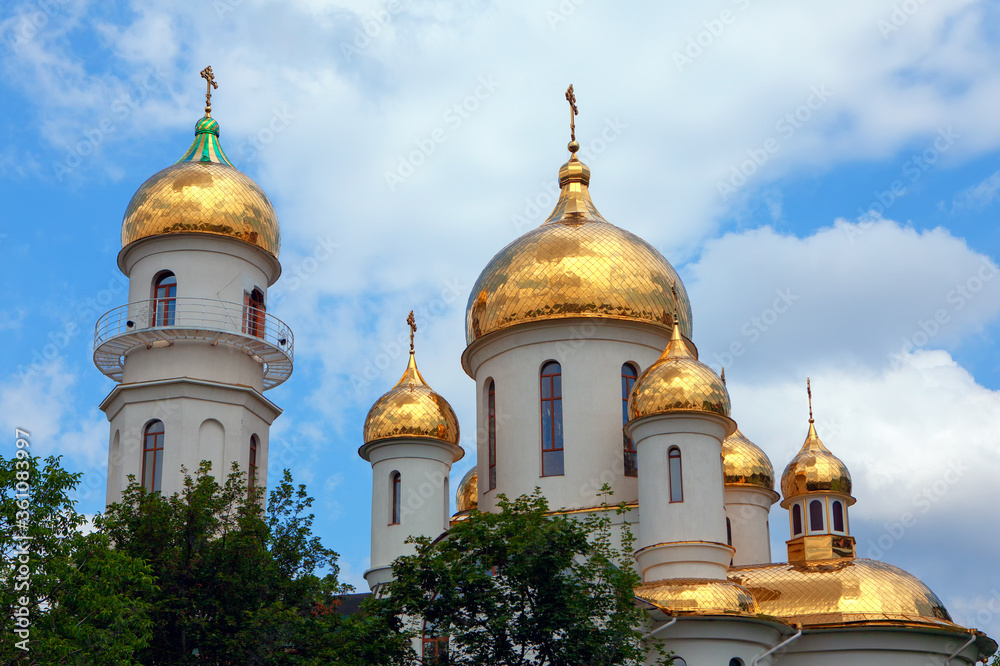 Golden Domes of Russian orthodox Church . Cupola with Cross on the Top 