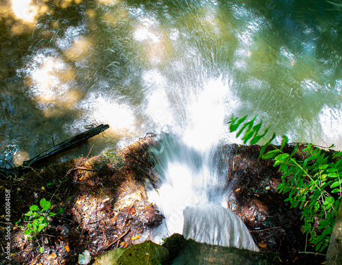 looking down at a little waterfall photo