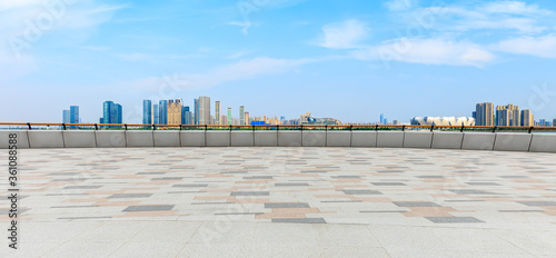 Empty floor and city skyline with buildings in hangzhou China.