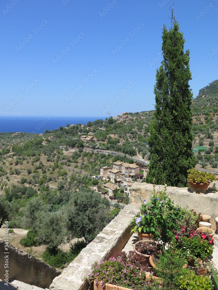the view from the iglesia parroquial in Deia, Tramuntana Mountains, Mallorca, Spain, in the month of June