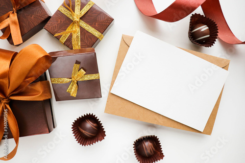 chocolate candies and gift box. set of gift cards with roses and ribbon