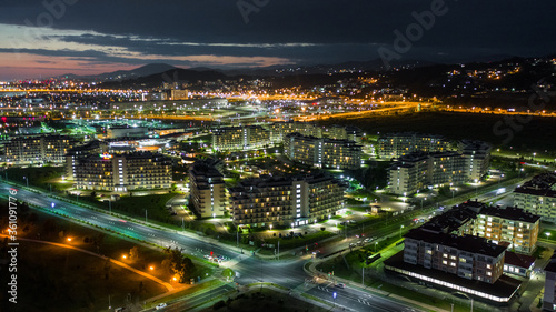 Wallpaper Mural Night city. Evening lighting of the building. Residential area of the city. Sochi Olympic Park. Sunset. Multi-storey building. Torontodigital.ca