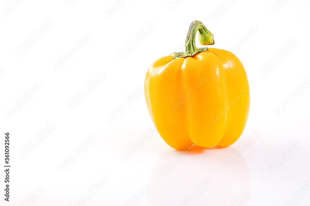 Fresh one yellow capsicum annuum or sweet chili or bell pepper isolated on white background with clipping path. Vegetarian or healthy food concept. Fresh one yellow capsicum annuum or sweet chili or bell pepper isolated on white background with clipping path. Vegetarian or healthy food concept.