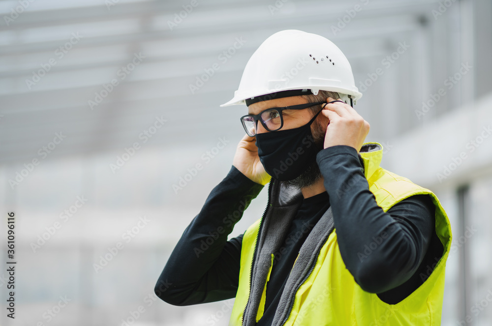 Portrait of worker with face mask at the airport. Portrait of worker with face mask at the airport.