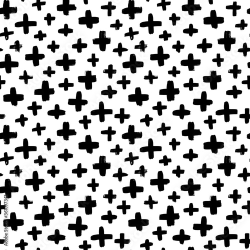 Black crosses vector seamless pattern. Hand drawn cross and plus sign. Black paint brush strokes geometrical pattern for wallpaper, web page background, textile design, graphic design.
