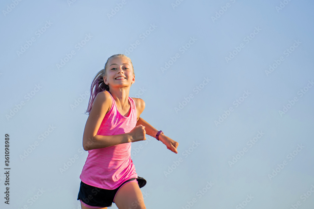 Girl jogging on a sunny summer evening Girl jogging on a sunny summer evening