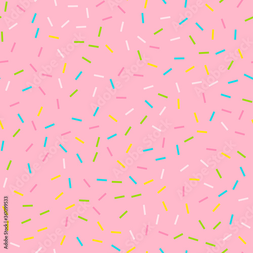 Seamless background. Pink donut glaze or ice cream top with many decorative sprinkles. Celebration confetti pattern