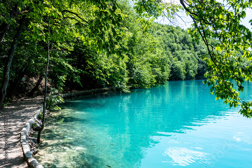 Picturesque morning in Plitvice National Park. Colorful spring scene of green forest with pure water lake. Great countryside view of Croatia  Europe