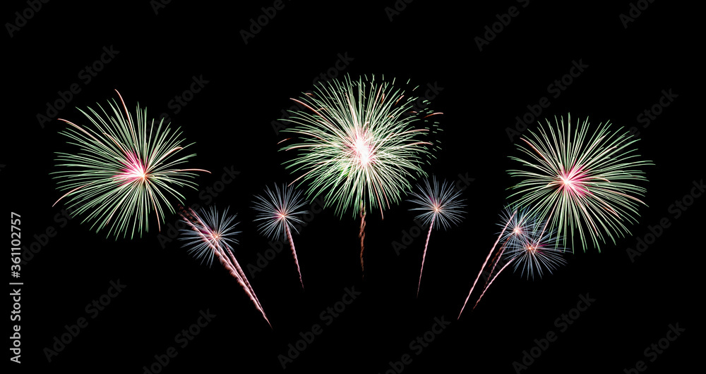 Festive green fireworks on black background for celebration and anniversary Festive green fireworks on black background for celebration and anniversary