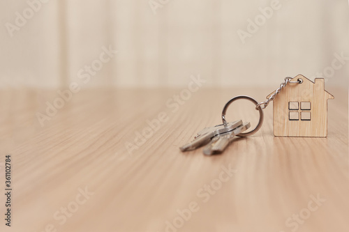 keys with keychain, represents real estate