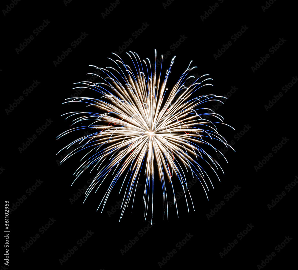 Obraz premium Blue and yellow fireworks display on night sky
