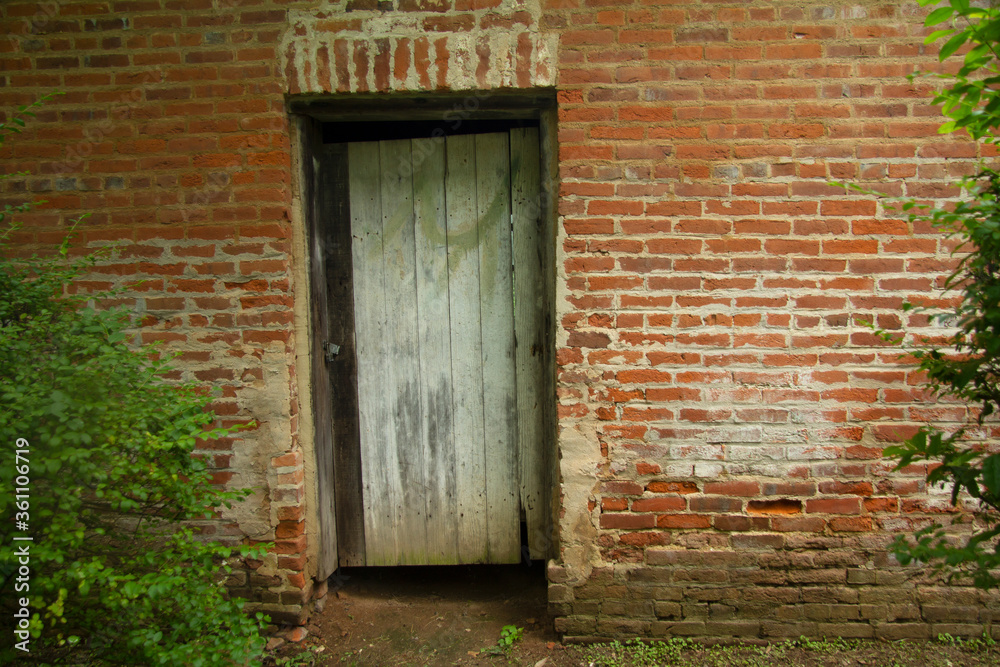 door brick wall
