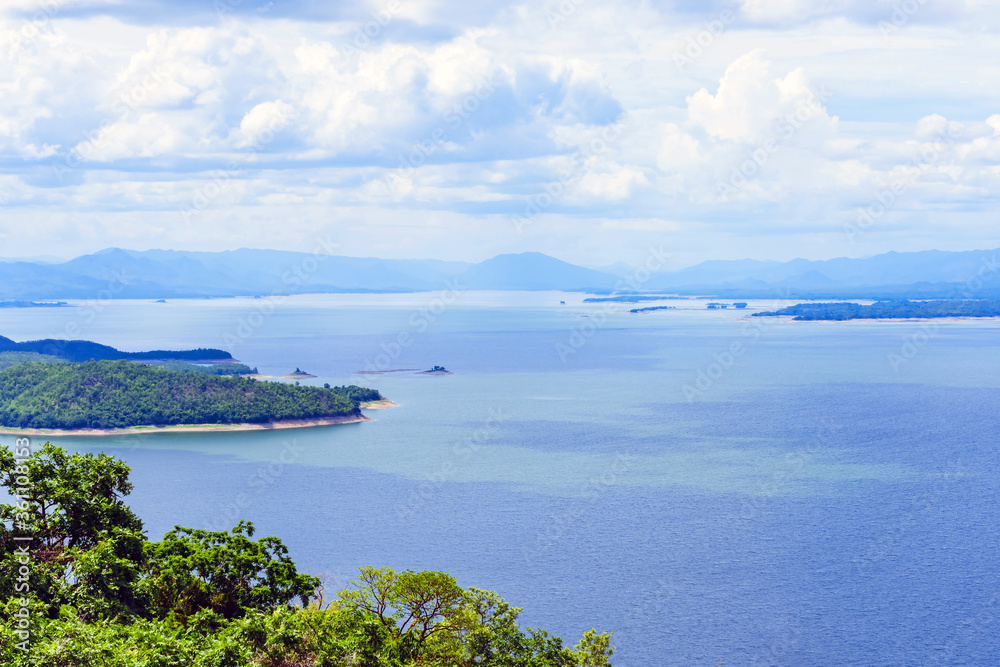 Beautiful scenery views of nature with a large reservoir above the Srinagarind Dam in Si Sawat District, Kanchanaburi Thailand. Beautiful scenery views of nature with a large reservoir above the Srinagarind Dam in Si Sawat District, Kanchanaburi Thailand.