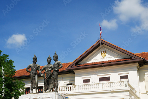 The three kings monument on day noon light in Chiang Mai, Thailand. The three kings monument is a royal monument that built the Lanna kingdom or Chiang Mai city in now.