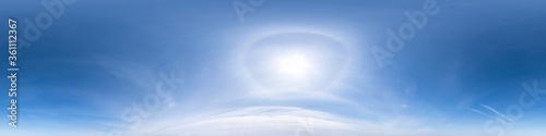 Leinwand Poster clear blue sky with halo sun