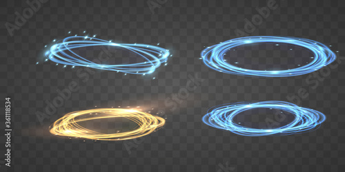 Set of Fire light circles trails of sparkling gold glitter on transparent background. Golden and blue energy light spiral frames