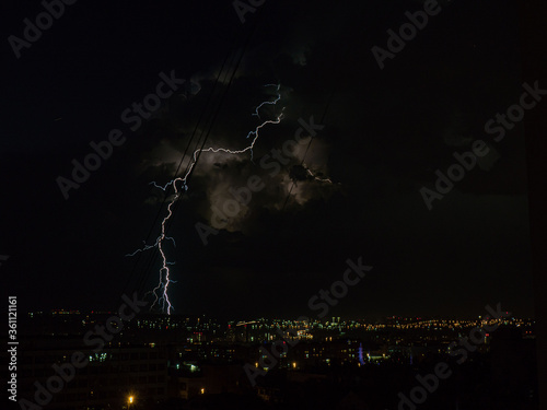 Thunderstorm over the night city