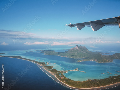 aerial view upon island resort and tropical island