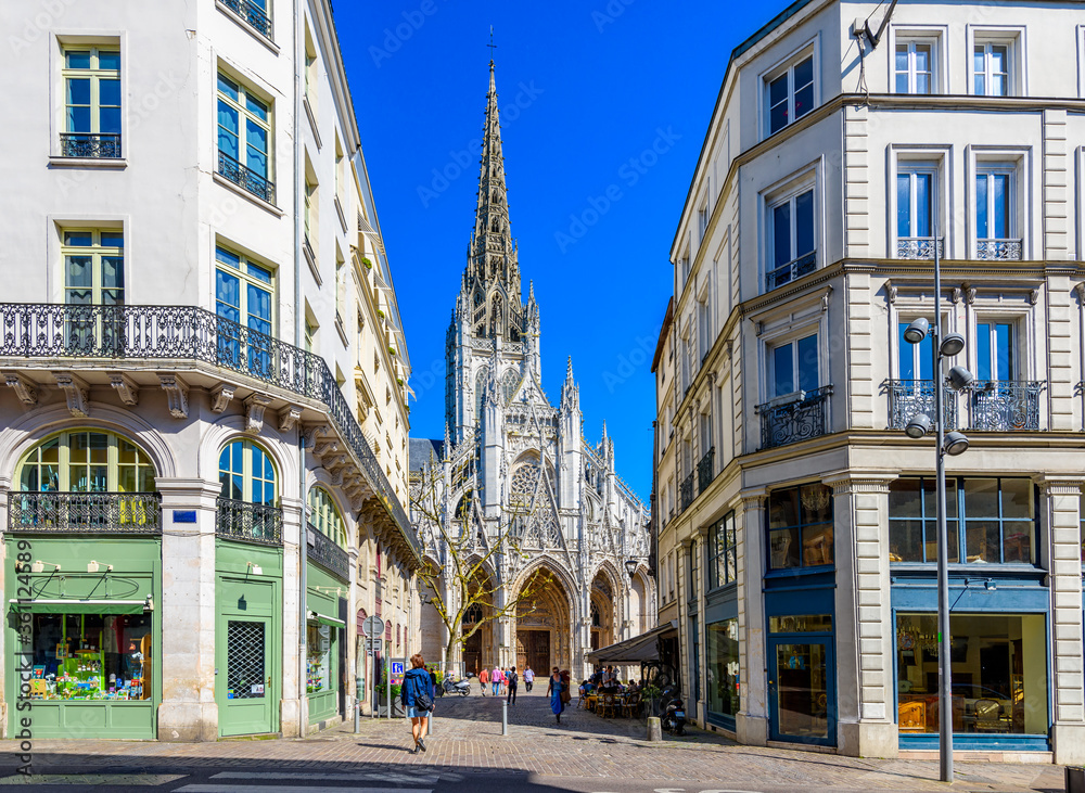Cozy street with Church of Saint-Maclou in Rouen, Normandy, France. Architecture and landmarks of Rouen. Cozy cityscape of Rouen