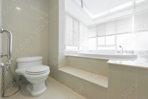 white tiled modern restroom
