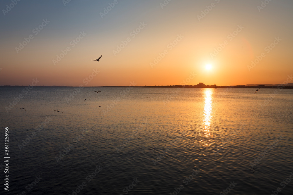 Beautiful sunset over the bay of Pomorie. Black Sea. Bulgaria. Beautiful sunset over the bay of Pomorie. Black Sea. Bulgaria.
