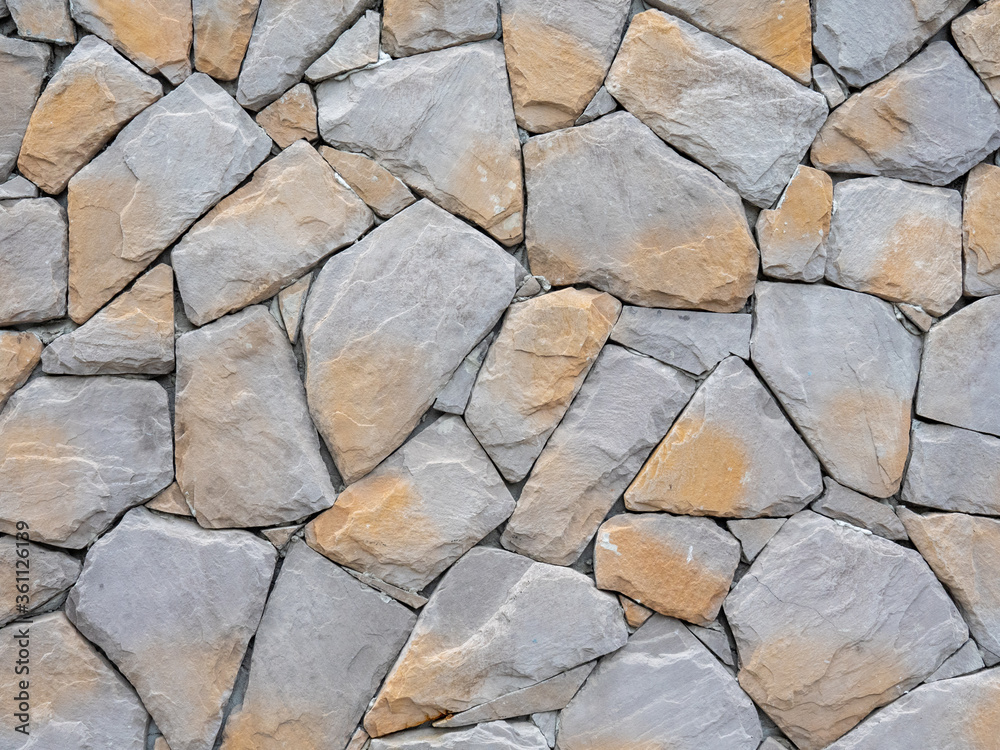 Fototapeta premium The stone walls are composed of many beautiful stones,background
