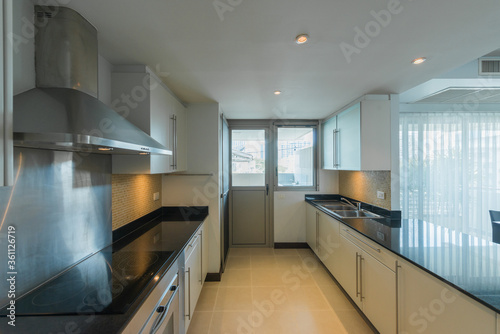 Modern kitchen interior with electric and microwave ove
