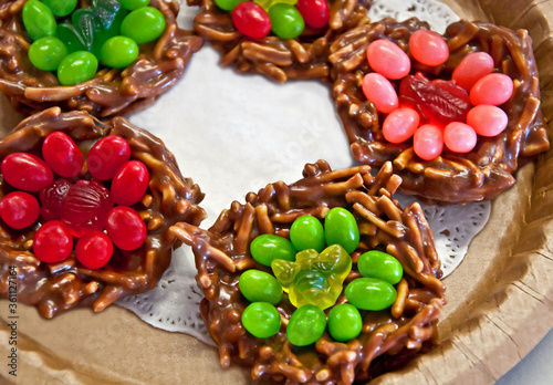 Fototapeta This plate of no bake Christmas cookies is a dish of holiday goodies in red and green