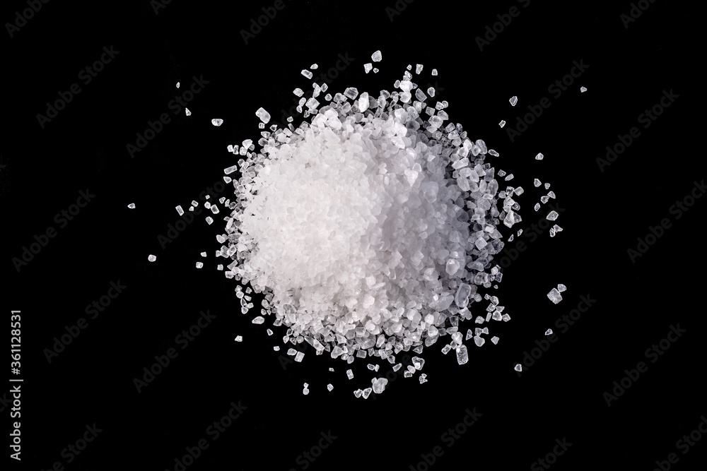 white salt on black table