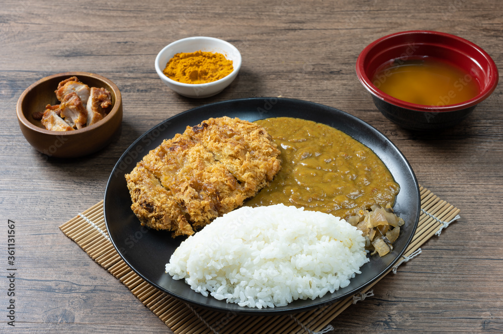 Tonkatsu Curry Rice (Japanese deep-fried pork cutlet with Curry rice) served with karaage (Japanese style fried chicken).