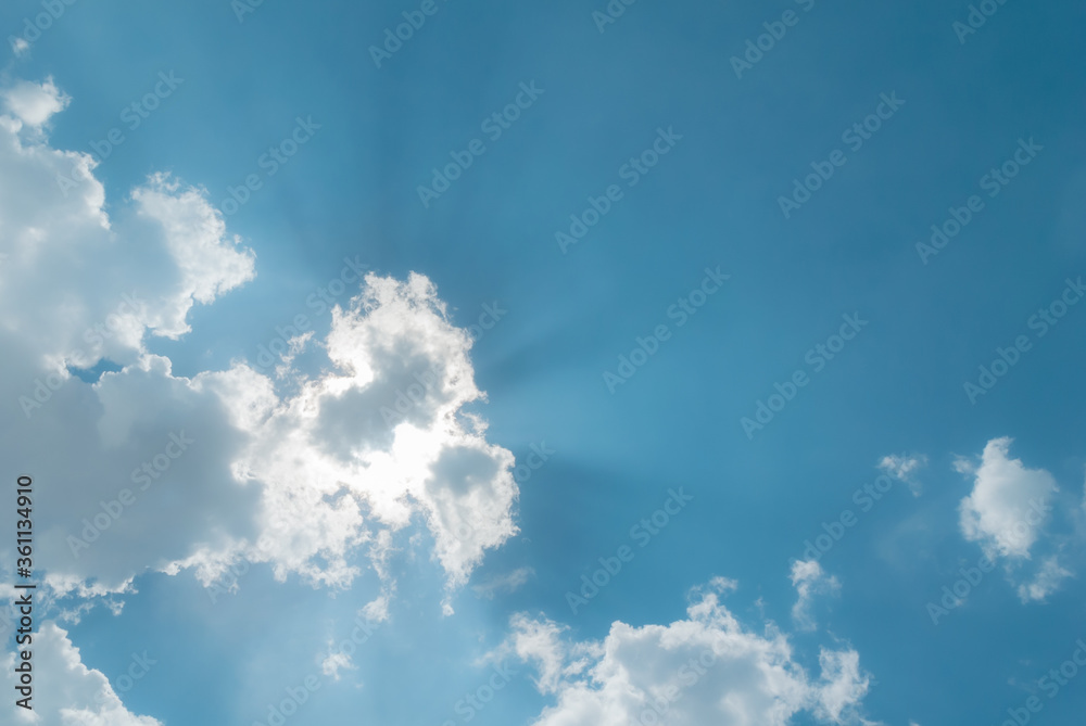 Fototapeta premium Cloudy blue sky with sunlight