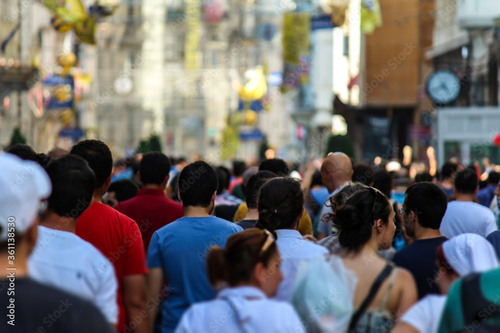 a group of protesters walking through a street