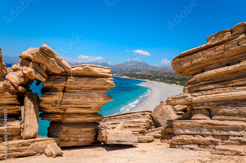 The long sandy beach of Triopetra in south Crete.The beach is named after the three rocks in the sea.