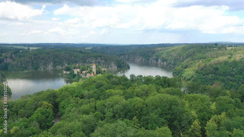 Aerial view on czech medieval castle Zvikov, situated on rocky outcrop above the confluence of two rivers Vltava and Otava, Czech republic Aerial view on czech medieval castle Zvikov, situated on rocky outcrop above the confluence of two rivers Vltava and Otava, Czech republic