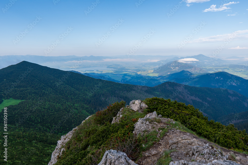 Naklejka premium Panoramic photo of summer mountain of Tatra ridge, Slovakia, summer in the mountains. Travel and hike