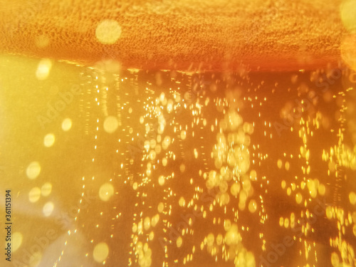 beer bubbles background. Inside a glass of beer. Macro photography of nature