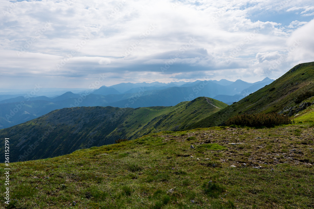 Panoramic photo of summer mountain of Tatra ridge, Slovakia, summer in the mountains. Travel and hike
