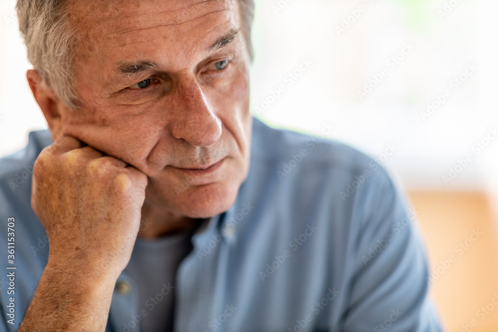 Senior man lost in thought 
