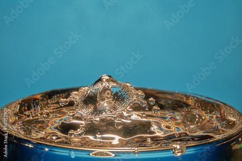  Falling water drop collision with beautiful reflections