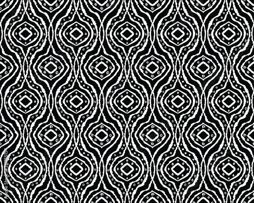 Seamless ikat pattern with waves for fabric, textile, wallpaper, book cover, wrapping paper, black and white seamless  textured background  photo