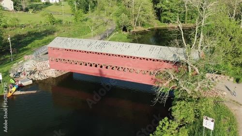 Wallpaper Mural Unrecognizable kayakers on river by covered bridge in Gettysburg PA, aerial drone view Torontodigital.ca