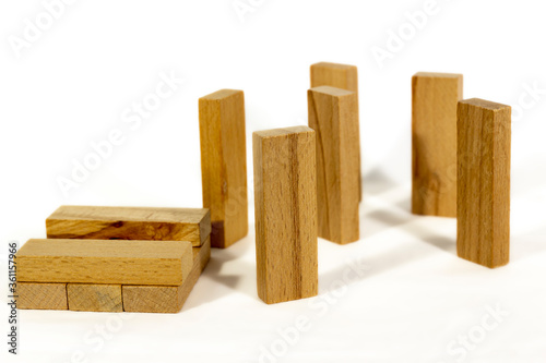 Fototapeta Naklejka Na Ścianę i Meble -  Wooden game blocks, just started building up, pieces stand vertical