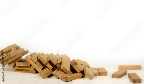 Fallen wooden game blocks, scattered on ground