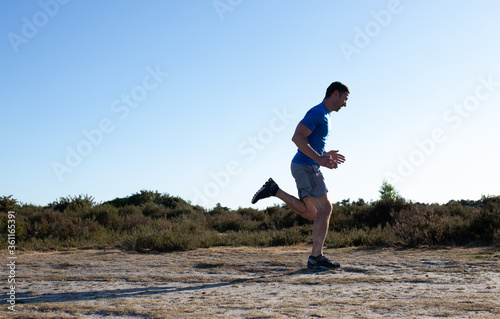man sprinting in the countryside © Steve