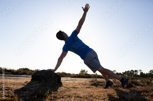 Man doing exercise in the countryside