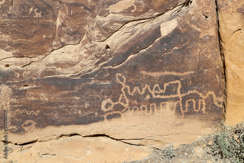 Ancient Native American Indian rock art petroglyph lines Utah 1489. Nine Mile Canyon, Utah. World’s longest art gallery of ancient native American, Indian rock art, hieroglyphs, pictographs.