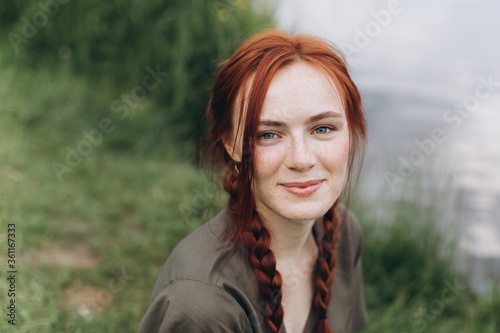 Close up beautiful woman portrait natural face freckles casual female portrait lifestyle beauty girl with pigtails